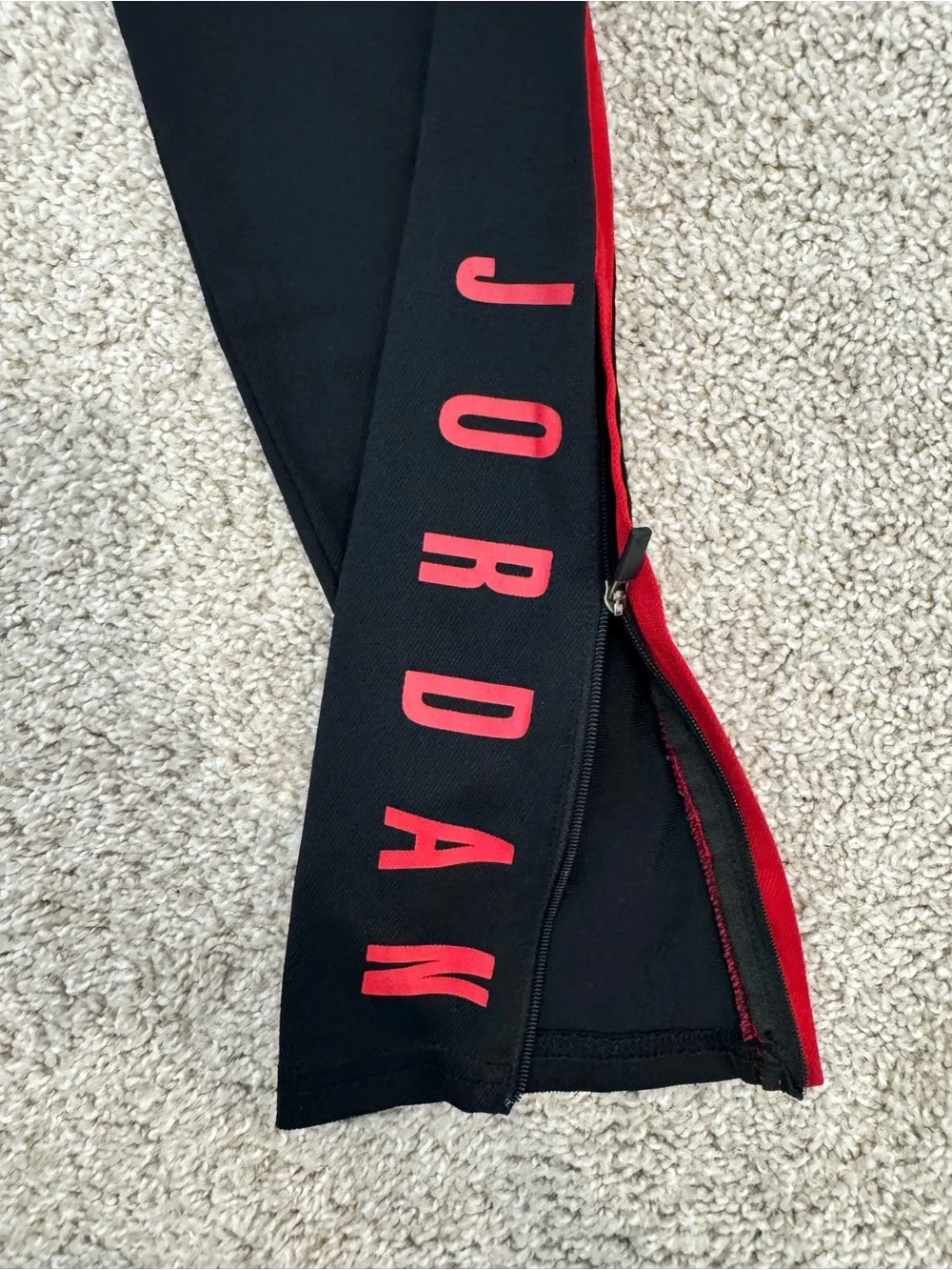 Jordan Black Joggers with Red Side Panels